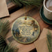 A decorative ornament featuring a painting of Harriet Tubman, the famous Underground Railroad escapees, along with a lantern and a bridge, is displayed on a wooden surface.