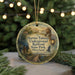 A round ornament with a painting of a woman and a bird, surrounded by greenery, with text that reads "Harriet Tubman Underground Railroad State Park, Maryland".