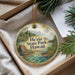 A decorative ornament with a scenic image of a tropical landscape, featuring a house, palm trees, and mountains, along with the text "He'eia State Park, Hawaii".