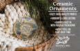 Ceramic ornaments, featuring a round ornament with a scenic image of Hearst San Simeon State Park, California, hanging from a wicker basket.