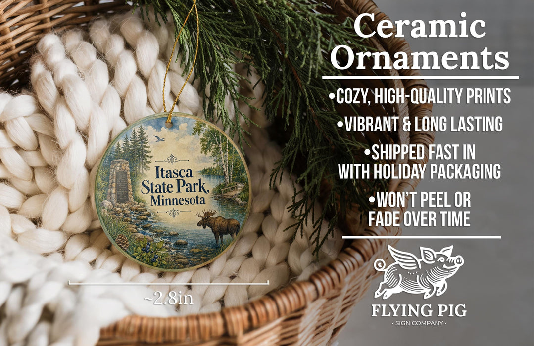 Ceramic ornaments, featuring a moose and a scenic landscape, are displayed in a woven basket.