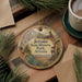 A decorative ornament featuring a scenic image of Jerome State Historic Park, Arizona, with a small building and desert landscape in the background.