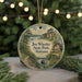 A round ornament featuring a scenic landscape of Joe Wheeler State Park, Alabama, with a boat on the water and a path leading through the trees.