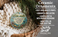 Ceramic ornaments, featuring a tropical scene with palm trees and a lighthouse, are displayed in a basket.