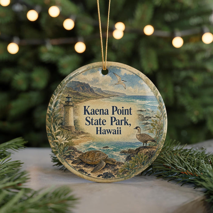 A circular ornament featuring a lighthouse, a bird, and a turtle, with the text "Kaena Point State Park, Hawaii" displayed on it.