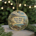 A circular ornament featuring a lighthouse, a bird, and a turtle, with the text "Kaena Point State Park, Hawaii" displayed on it.