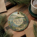 A decorative ornament featuring a scenic image of Kaw River State Park, Kansas, with a bird and a canoe in the foreground.