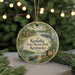 A round ornament with a scenic view of Kenlake State Resort Park, Kentucky, featuring a lake, a cabin, and a bird.