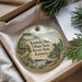 A decorative ornament with a scenic image of Kentucky State Resort Park, featuring a house, a bridge, and a river, hanging from a string.