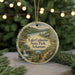 A round ornament with a scenic landscape of Lake Catherine State Park, Arkansas, featuring a waterfall and a cabin in the background.
