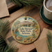 A decorative ornament featuring a scenic landscape of Lake Havasu State Park, Arizona, with palm trees, mountains, and a bird in the foreground.