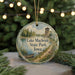 A round ornament with a scenic image of Lake Macbride State Park, Iowa, featuring a lake, a tower, and a path surrounded by trees and flowers.