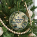 A circular ornament hanging on a Christmas tree, featuring a scenic image of Lake Murphysboro State Park, Illinois.