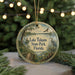 A circular ornament with a scenic image of Lake Talquin State Park, Florida, featuring a bird, a boat, and a path.