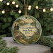 A round ornament featuring a scenic landscape with a river, cabin, and two figures, along with the text "Lewis and Clark State Park, Iowa".