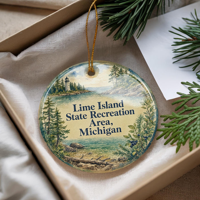 A decorative ornament with a scenic landscape of a lake, forest, and mountains, featuring the text "Lime Island State Recreation Area, Michigan".