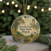 A round ornament with a scenic landscape of the Lincoln Trail State Park in Illinois, featuring a tower and a waterfall.