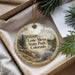 A decorative ornament with a scenic landscape of Lone Mesa State Park, Colorado, hanging from a string.
