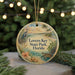 A circular ornament with a beach scene and tropical birds, featuring the text "Lovers Key State Park, Florida" on it.