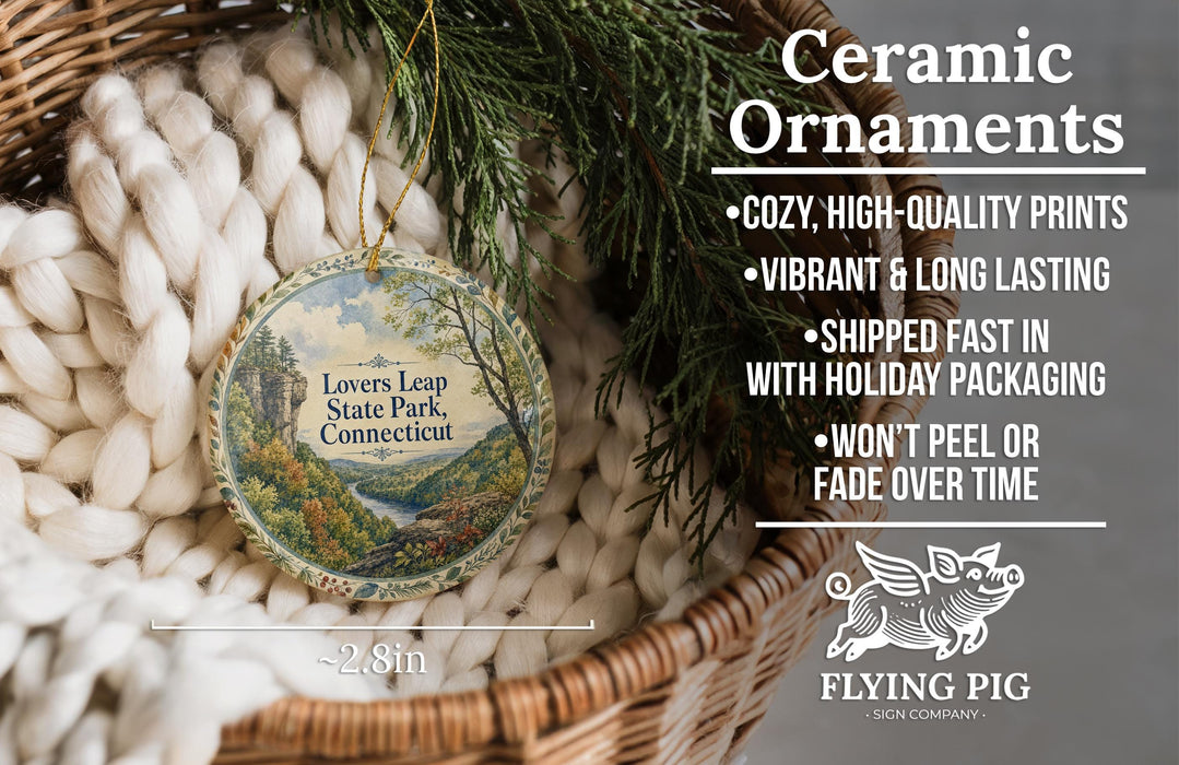 Ceramic ornaments, featuring a nature scene with a river and trees, are displayed in a basket.