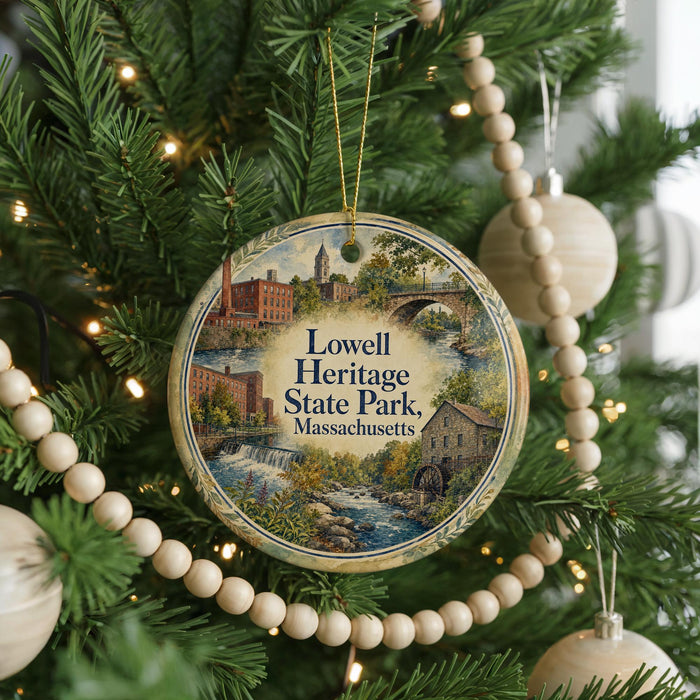 A round ornament on a Christmas tree, featuring an illustration of Lowell Heritage State Park in Massachusetts.