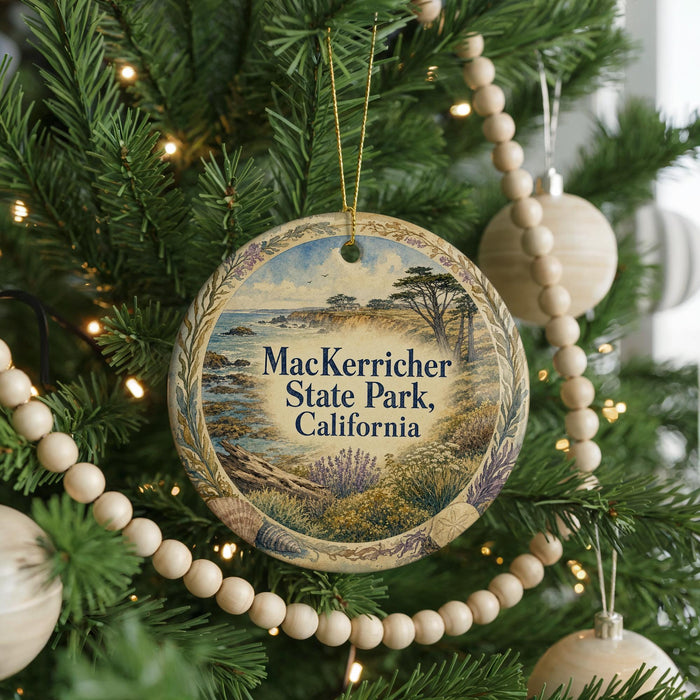 A Christmas tree decorated with ornaments, including a circular ornament with a scenic image of Mac Kerrr Park, California.