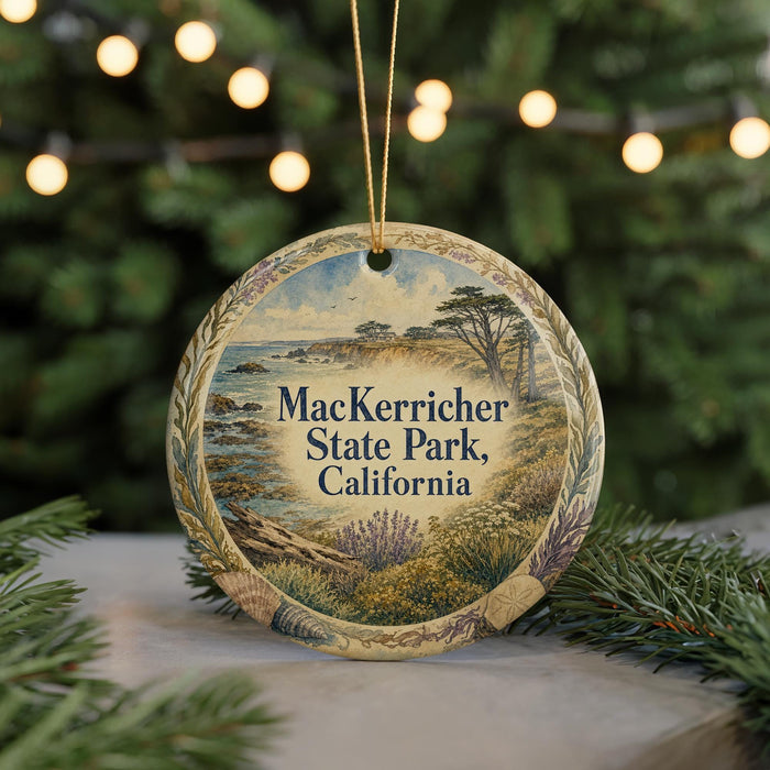 A round ornament with a scenic landscape of Mac Kerr State Park, California, featuring a beach, mountains, and trees.