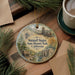 A decorative ornament featuring a scenic illustration of Malakoff Diggin's State Historic Park, California, with a cup of coffee and pine branches in the background.