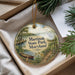 A round ornament with a scenic image of Martinak State Park, Maryland, featuring a boat, a bird, and a path along a river.