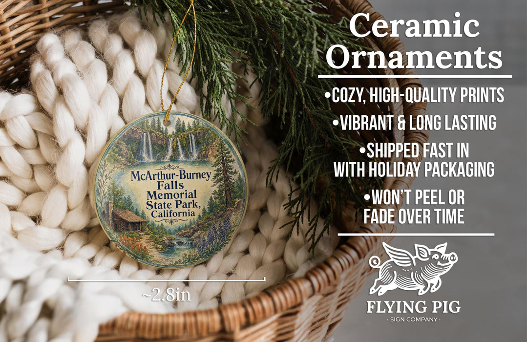 Ceramic ornaments, specifically a round ornament with a scenic image of theMcArthur-Burney Falls Memorial State Park, California. The ornament is hanging from a wicker basket, and there is a text overlay providing information about the ornament.