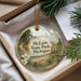 A decorative ornament with a scenic landscape of a lake, forest, and mountains, featuring the text "McLain State Park, Michigan".