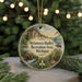 A round ornament with a scenic landscape featuring a river, a cabin, and a boat, along with the text "Metamora-Hadley Recreation Area, Michigan".