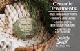 Ceramic ornaments, featuring a detailed illustration of a lake and wildlife, are displayed in a woven basket. The text highlights the ornaments as "Ceramic Ornaments" with a description of their features, including "Cozy, high-quality prints", "Vibrant & long lasting", "Shipped fast in with holiday packaging", and " Won't peel or fade over time". The image also includes a scale for size comparison and the logo of "Flying Pig - SIGN COMPA