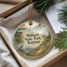 A decorative ornament with a scenic landscape of Milford State Park, Kansas, featuring a bird, a castle, and a body of water.