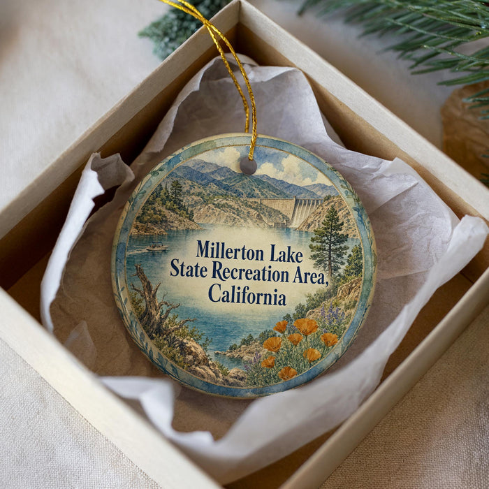 A round ornament with a scenic landscape of Millerton Lake, the Millerton State Recreation Area in California, displayed in a box with a white tissue paper lining.