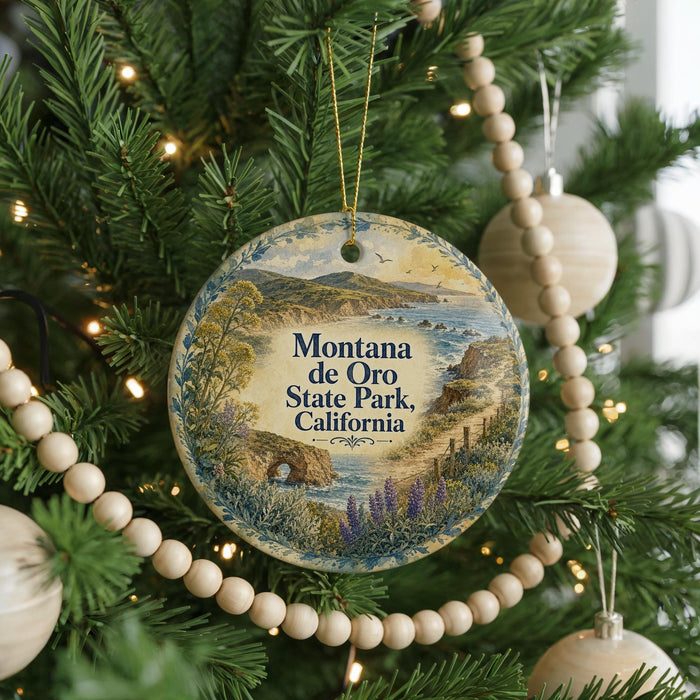 A round ornament hanging on a Christmas tree, featuring a scenic landscape of Montana State Park, California.