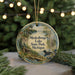 A round ornament with a scenic image of Muskallon Lake State Park, Michigan, featuring a duck, pine trees, and a cabin.