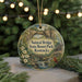 A decorative ornament featuring a scenic image of the Natural Bridge in Kentucky, with a bird perched on a branch and a bridge in the background.