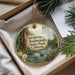 A decorative ornament with a scenic image of the Navarro River and Redwoods State Park in California, featuring a forest landscape with pine trees and a stream.