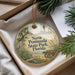 A decorative ornament with a scenic image of North Peninsula State Park, Florida, hanging from a string.
