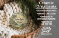 Ceramic ornaments, featuring a printed design of a scenic landscape, are displayed in a woven basket.