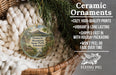 Ceramic ornaments, featuring a scenic image of Pinnacle Mountain State Park, Arkansas, hanging from a wicker basket.