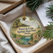 A decorative ornament with a scenic illustration of Ponce de Leon Springs State Park, Florida, hanging from a string.