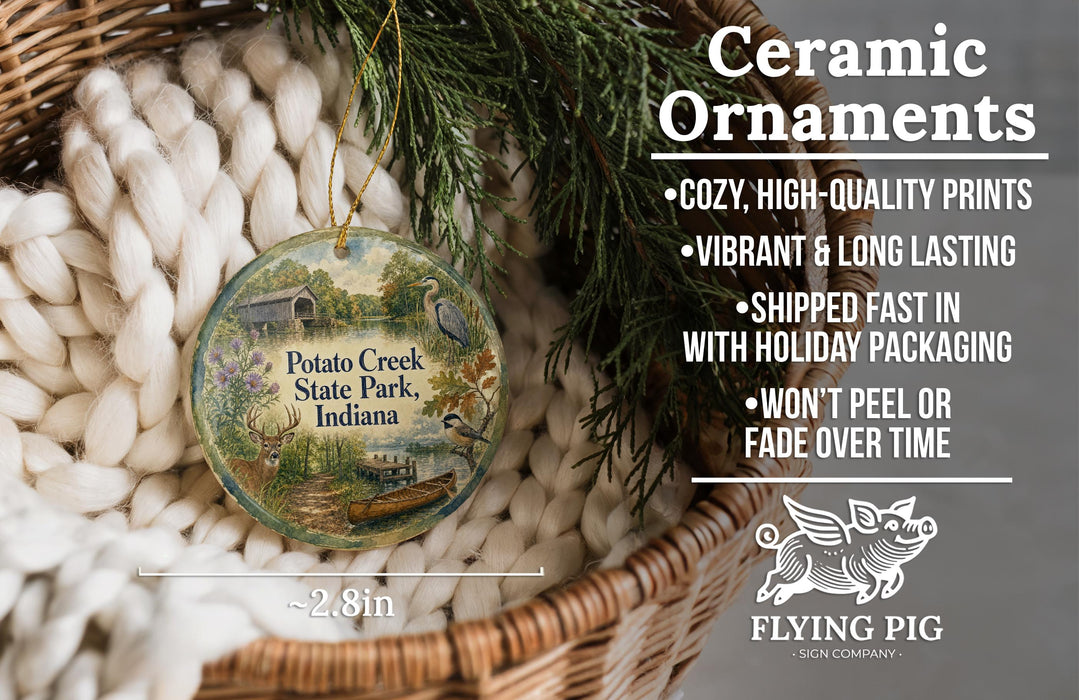 Ceramic ornaments, featuring a detailed illustration of Potato Creek State Park, Indiana, hanging from a wicker basket.