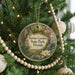 A round ornament hanging on a Christmas tree, featuring a scenic image of Ravine Gardens, State Park, Florida.