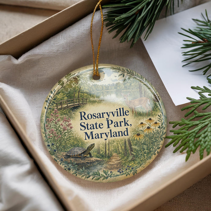 A decorative ornament with a scenic image of Rosaryville State Park, Maryland, hanging from a string.