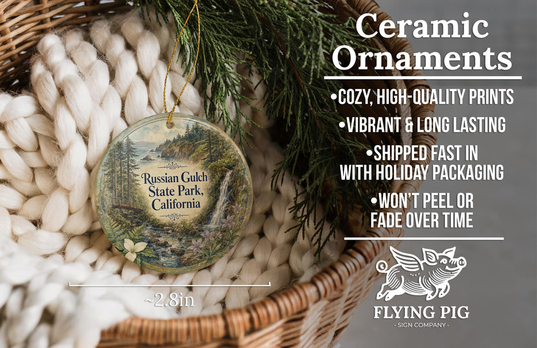 Ceramic ornaments, featuring a scenic image of Russian Gulch State Park, California, hanging from a wicker basket.