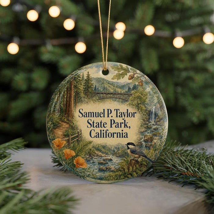 A round ornament with a scenic landscape of Samuel P. Taylor State Park, California, featuring a bird, trees, and a stream.