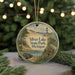 A round ornament featuring a scenic landscape with a lighthouse, trees, and a road, with the text "Silver Lake State Park, Michigan" displayed prominently.
