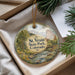 A decorative ornament with a scenic landscape of St. Vrain State Park, Colorado, featuring a river, mountains, and pine trees.